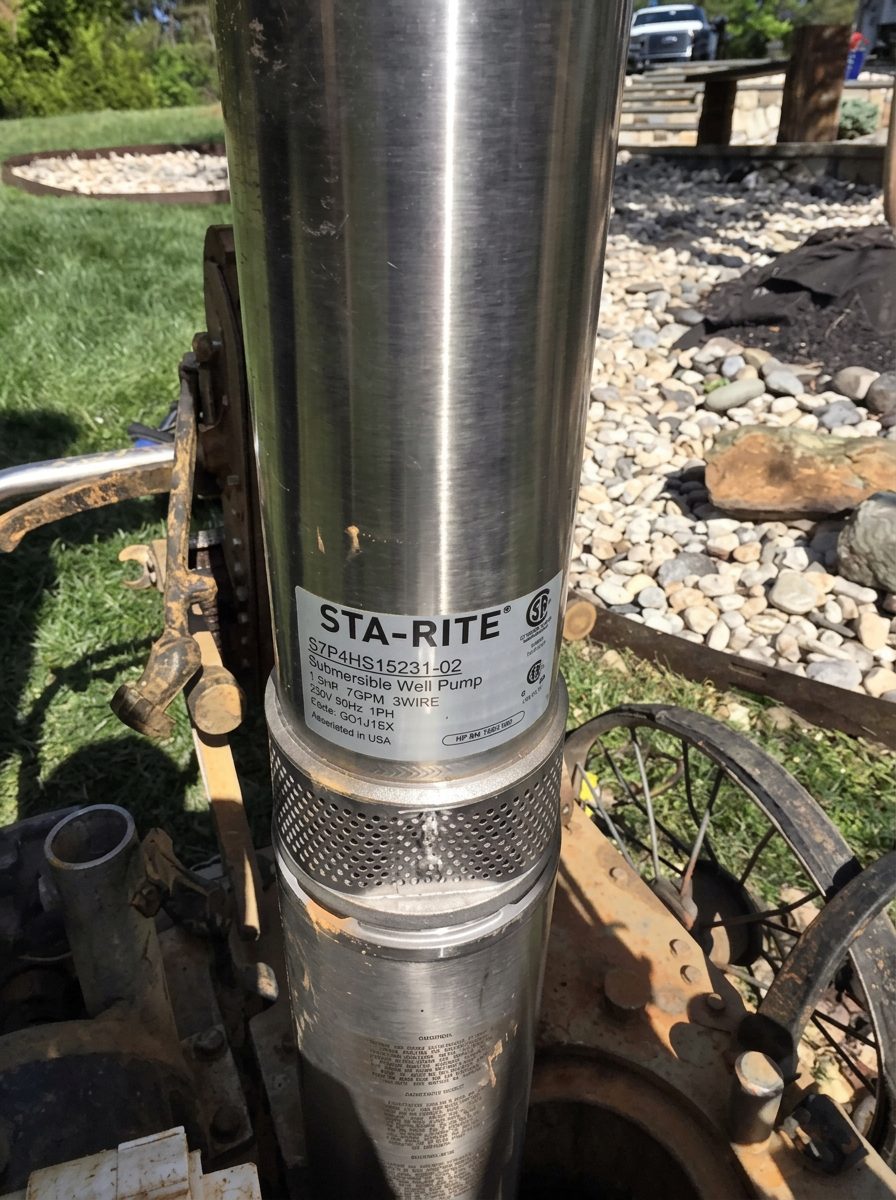 Sta-Rite submersible well pump at the well opening